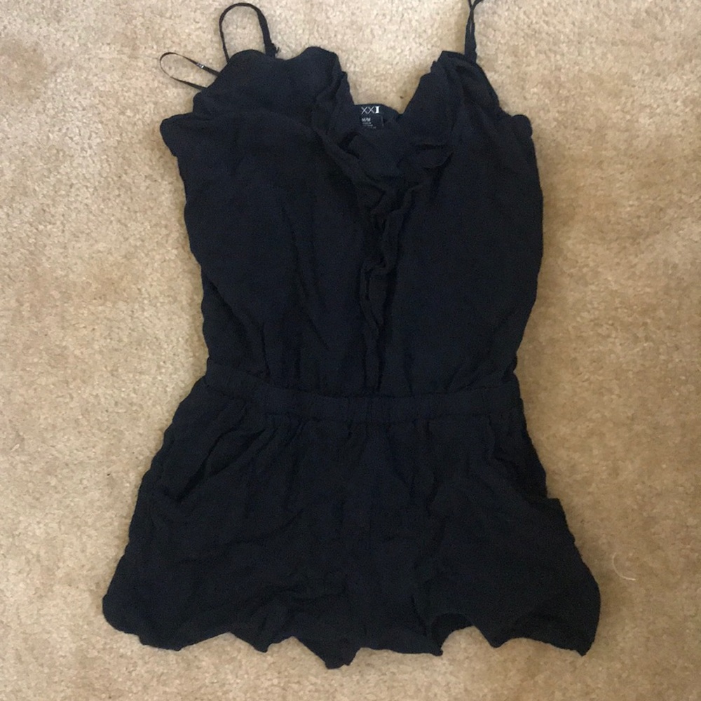 Black romper with ruffled front